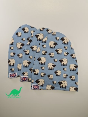 Various sizes of slouch beanie hats in light blue sheep fabric