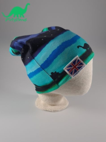 Blue midnight dinosaur fabric beanie hat on crocheted baby head